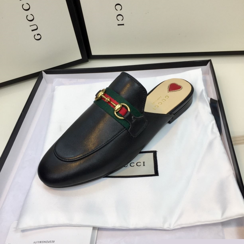 G*u*i slippers